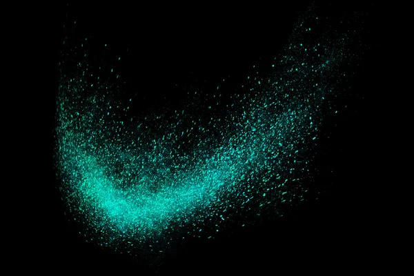 Siyah bir arka plan üzerinde renkli soyut toz patlama