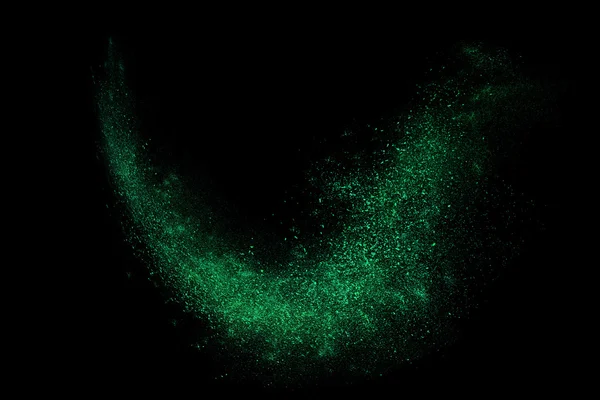 Siyah bir arka plan üzerinde renkli soyut toz patlama