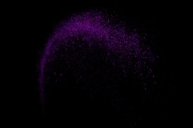 Siyah bir arka plan üzerinde renkli soyut toz patlama