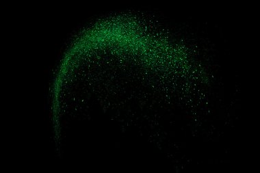 Siyah bir arka plan üzerinde renkli soyut toz patlama