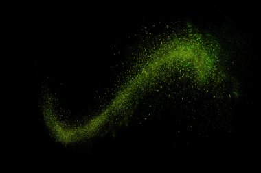 Siyah bir arka plan üzerinde renkli soyut toz patlama