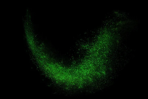 Siyah bir arka plan üzerinde renkli soyut toz patlama