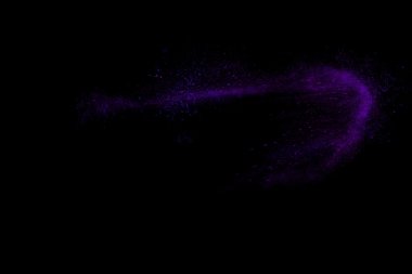 Siyah bir arka plan üzerinde renkli soyut toz patlama