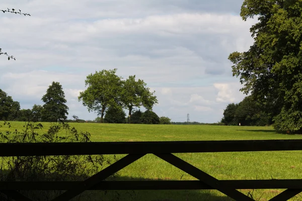 Gate at the entrance to a field — Stock Photo, Image