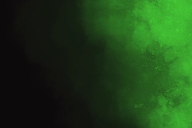 Siyah bir arka plan üzerinde renkli soyut toz patlama