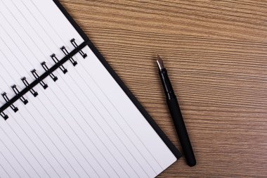 Görüntü bir defter bir ahşap yüzeye yat