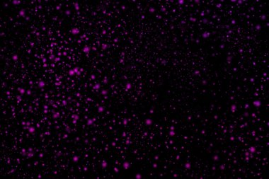 Siyah bir arka plan üzerinde renkli soyut toz patlama