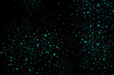 Siyah bir arka plan üzerinde renkli soyut toz patlama