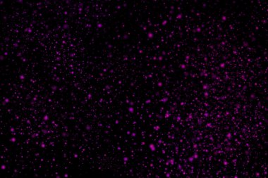 Siyah bir arka plan üzerinde renkli soyut toz patlama