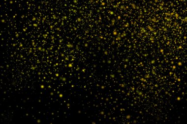 Siyah bir arka plan üzerinde renkli soyut toz patlama