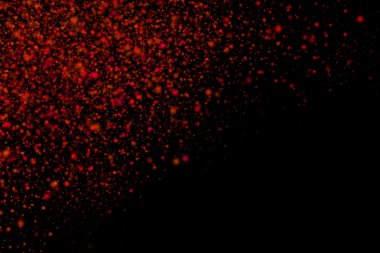 Siyah bir arka plan üzerinde renkli soyut toz patlama