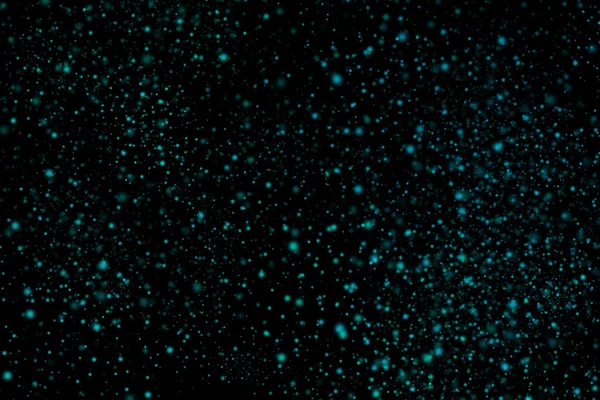 Siyah bir arka plan üzerinde renkli soyut toz patlama