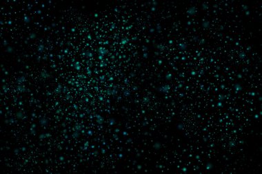 Siyah bir arka plan üzerinde renkli soyut toz patlama