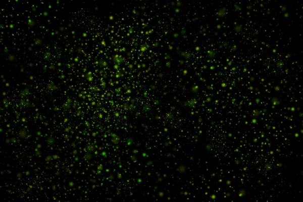 Siyah bir arka plan üzerinde renkli soyut toz patlama