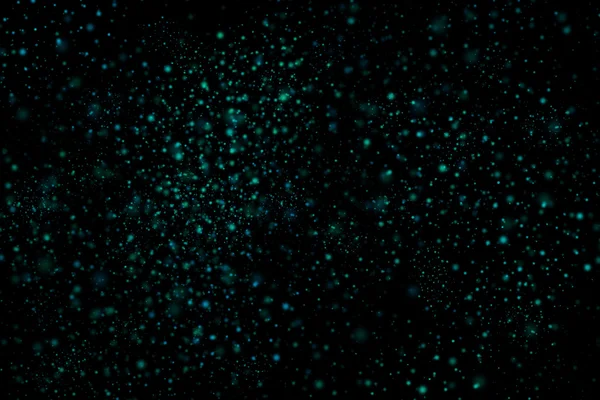 Siyah bir arka plan üzerinde renkli soyut toz patlama