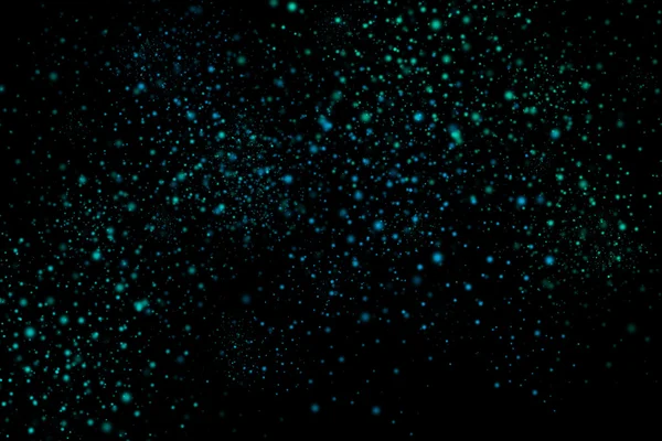 Siyah bir arka plan üzerinde renkli soyut toz patlama