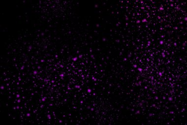 Siyah bir arka plan üzerinde renkli soyut toz patlama