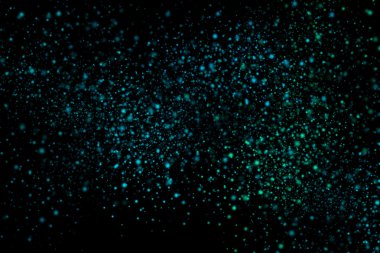 Siyah bir arka plan üzerinde renkli soyut toz patlama