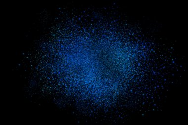 Siyah bir arka plan üzerinde renkli soyut toz patlama