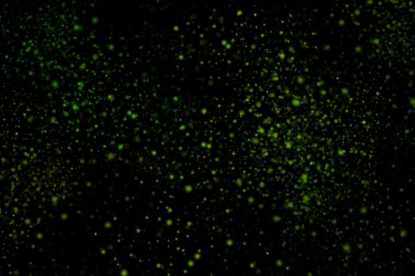 Siyah bir arka plan üzerinde renkli soyut toz patlama