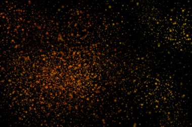 Siyah bir arka plan üzerinde renkli soyut toz patlama