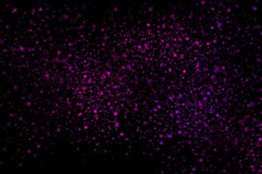 Siyah bir arka plan üzerinde renkli soyut toz patlama