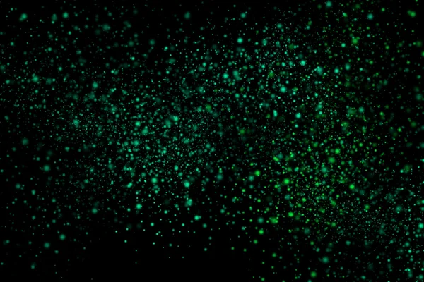 Siyah bir arka plan üzerinde renkli soyut toz patlama