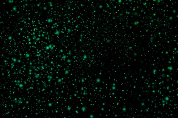 Siyah bir arka plan üzerinde renkli soyut toz patlama