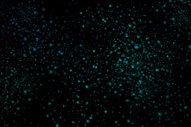 Siyah bir arka plan üzerinde renkli soyut toz patlama