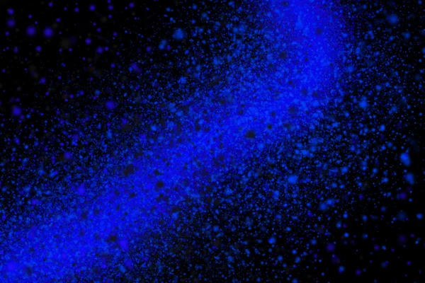 Explosión de polvo abstracto colorido sobre un fondo negro — Foto de Stock