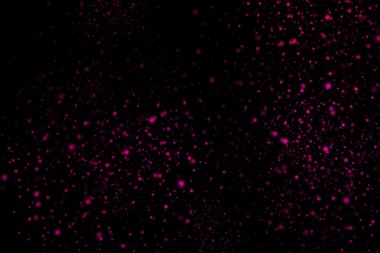 Siyah bir arka plan üzerinde renkli soyut toz patlama