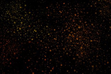 Siyah bir arka plan üzerinde renkli soyut toz patlama