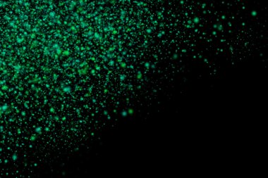 Siyah bir arka plan üzerinde renkli soyut toz patlama