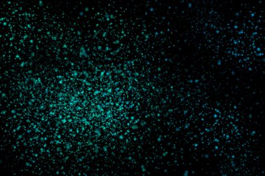 Siyah bir arka plan üzerinde renkli soyut toz patlama