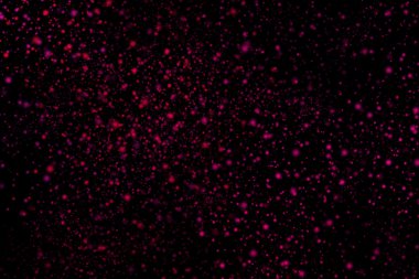 Siyah bir arka plan üzerinde renkli soyut toz patlama