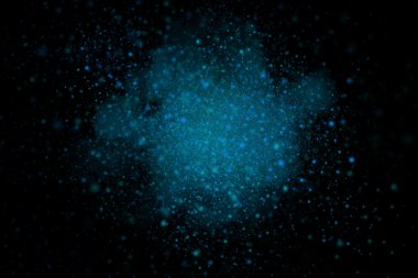 Siyah bir arka plan üzerinde renkli soyut toz patlama