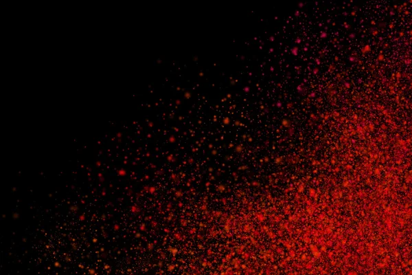 Explosión de polvo abstracto colorido sobre un fondo negro —  Fotos de Stock