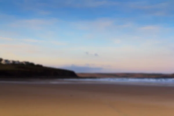 Early morning view over the beach at Polzeath Out of focus. — Stock Photo, Image