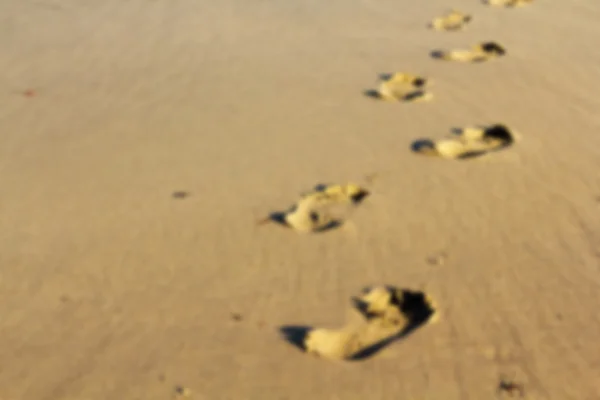 ピント ポルジース ビーチの砂の上の足跡. — ストック写真