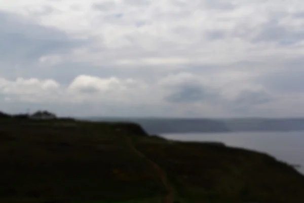 Вид з прибережних стежок між Widemouth затокою і Bude із — стокове фото