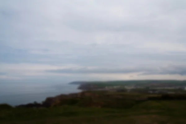 View over the coast near Bude in Cornwall Out of focus. — Stock Photo, Image