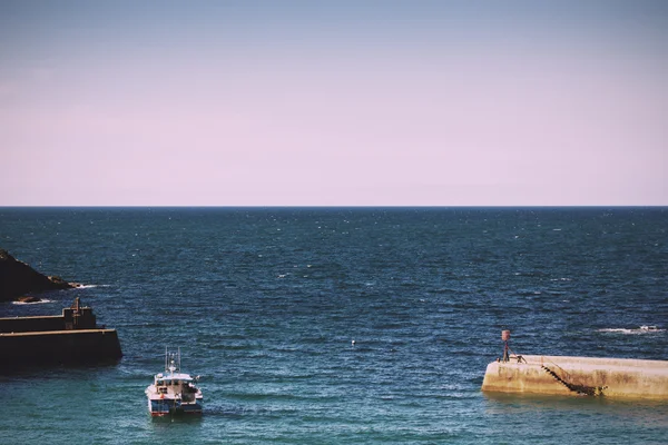 View of the harbour at Port Issac Vintage Retro Filter.