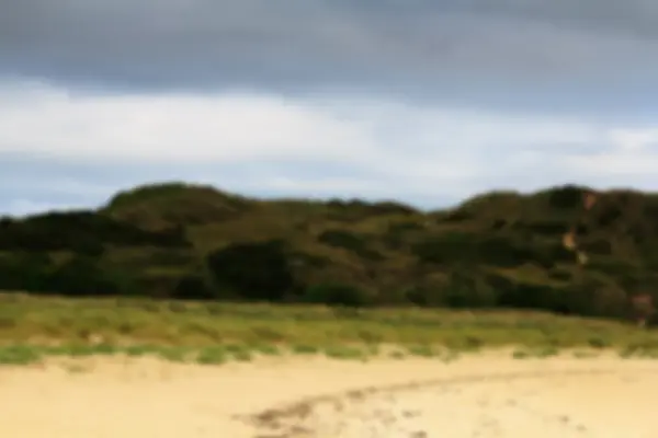 Vista a lo largo de la costa desde Rock cerca de Padstow Fuera de foco . —  Fotos de Stock