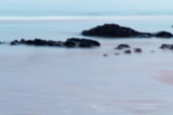 Uitzicht over Summerleaze Bude strand in Cornwall Out of focus. — Stockfoto