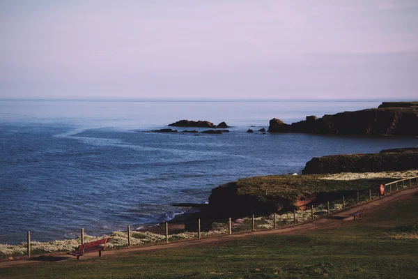 Cornish coastline viewed from the cliff in Bude Vintage Retro Fi — Stock Photo, Image