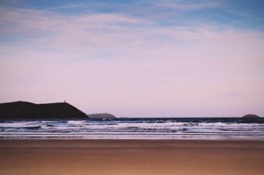 Polzeath Vintage Retro Filt plajda üzerinden sabah erken görünüm