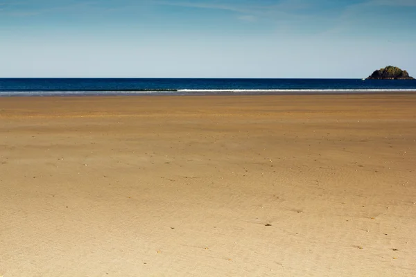 Polzeath Cornwall vasıl belgili tanımlık kıyı üzerinde göster — Stok fotoğraf