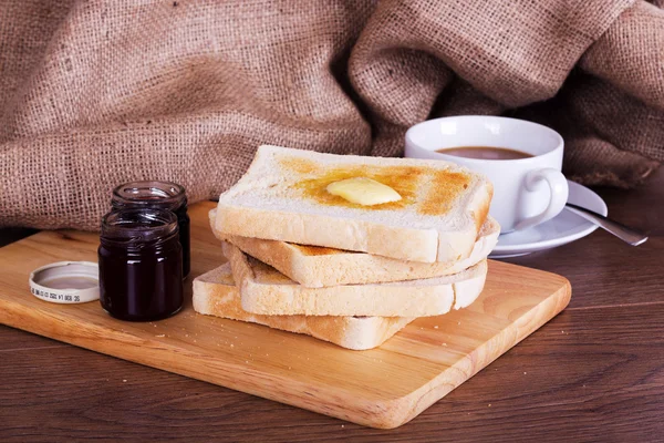 Slices of toast against a rustic background — Stock Photo, Image