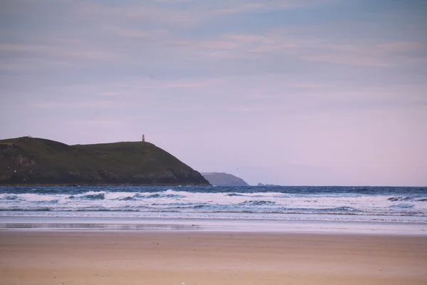 Polzeath Vintage Retro Filt plajda üzerinden sabah erken görünüm — Stok fotoğraf