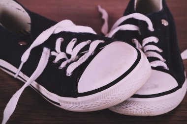 Eski ahşap zemin Vintage Retro filtre üzerinde ayakkabı tuval.